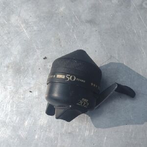Zebco 50th Anniversary Black 202 Fishing Reel. NWOT